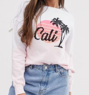 River Island – Sweat-shirt effet tie-dye avec slogan