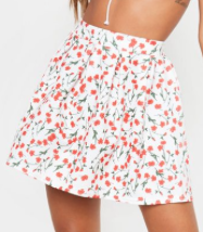 MINI-JUPE PLISSÉE BLANCHE IMPRIMÉ FLORAL PrettyLittleThing