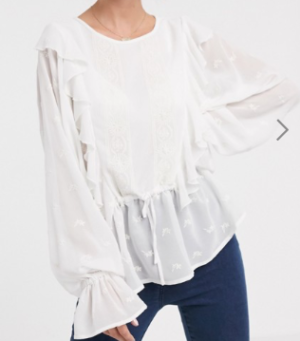ASOS DESIGN – Top à manches longues avec volants et broderies