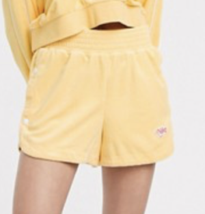 Nike – Short en tissu éponge – Jaune
